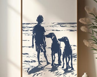 May include: A framed print depicting a boy and two dogs on a beach. The artwork is rendered in shades of blue and white, with the figures silhouetted against the background. The print is displayed on a wooden shelf.