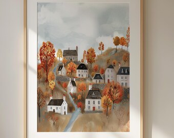 May include: Framed art print showing a village scene with white houses and dark roofs set amongst autumnal trees. A blue stream winds through the landscape. The artwork is set against a backdrop of a cloudy sky.
