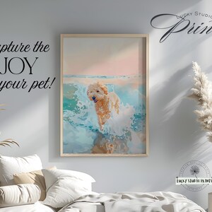 May include: A framed print featuring a golden doodle dog playing in ocean waves. The artwork has a watercolor style with a light pink and blue color palette. Text on the print reads "Capture the JOY of your pet!" and "Lucky Studio Prints".