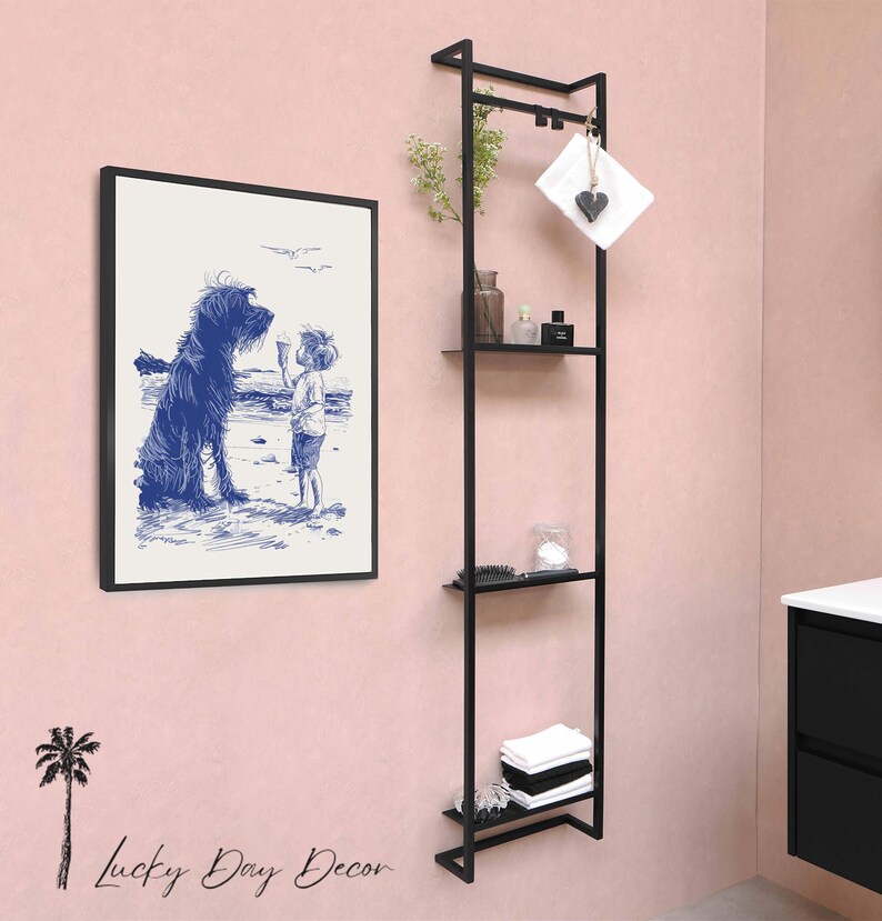 a bathroom with a pink wall and black shelving unit