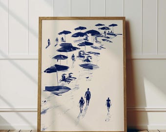 May include: A blue and white abstract print of people walking on a beach with umbrellas and chairs. The print is in a wooden frame.