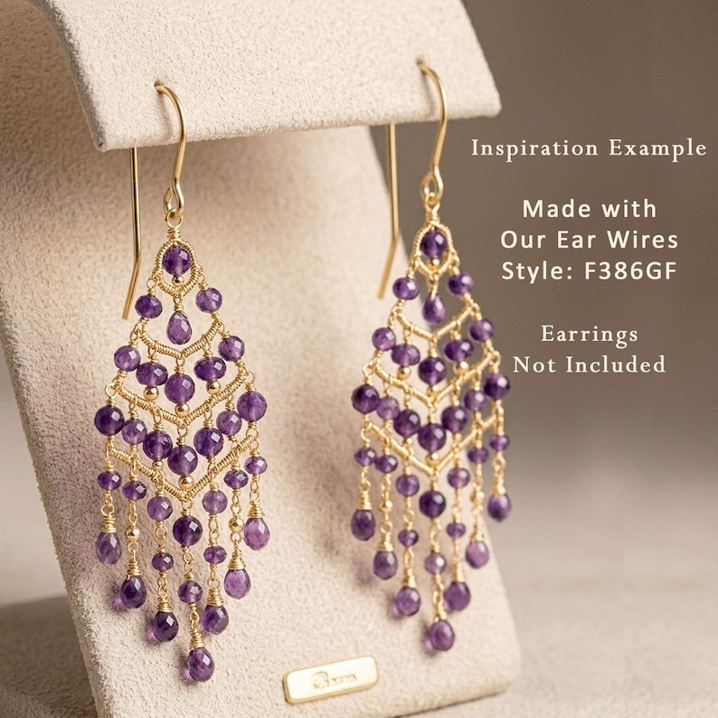 May include: Gold-tone chandelier earrings with amethyst beads. The earrings have a cascading design with multiple strands of purple beads. The text on the image says "Inspiration Example" and "Made with Our Ear Wires Style: F386GF. Earrings Not Included."