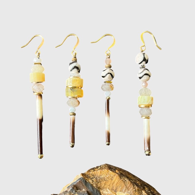 Yellow opal, zebra agate, porcupine quill and moonstone dangle earrings with gold plated earring hooks.