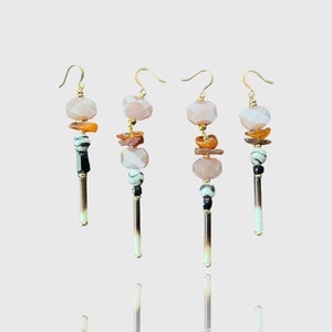 Porcupine quill dangle earrings with zebra agate, pink moonstone and copal bead detail, gold plated hook earrings.