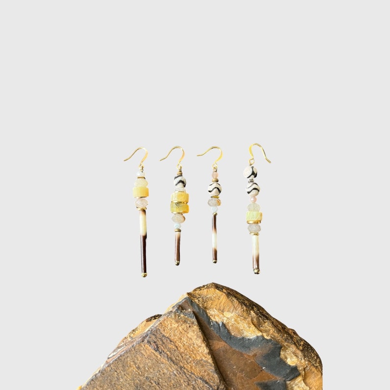 Yellow opal, zebra agate, porcupine quill and moonstone dangle earrings with gold plated earring hooks.