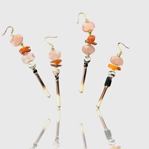 Porcupine quill dangle earrings with zebra agate, pink moonstone and copal bead detail, gold plated hook earrings.