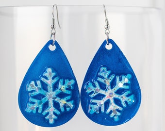 Festive glittery snowflake dangle earrings holiday bright blue