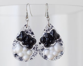 Fun, medium sized tear drop earrings with black and white plastic gummy bears