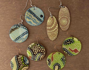 Lightweight fine art paper and resin in greens, blues, and browns, circular and oval