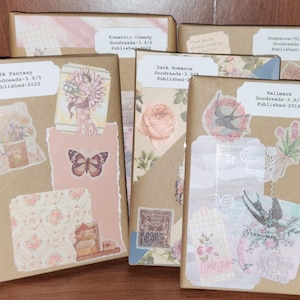 May include: A collection of wrapped books with decorative paper and stickers. The books are labeled with genres like YA Fantasy, Romantic Comedy, and Dark Romance. Each book has a Goodreads rating and publication year.