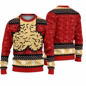 Könnte beinhalten: Ein langärmeliger Pullover mit Rundhalsausschnitt in Rot und Beige mit einem geometrischen Muster. Auf der Vorderseite befindet sich eine große, beige, gehirnartige Grafik. Das Design enthält horizontale Bänder mit schwarz-weißen Schneeflocken.
