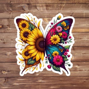 May include: A colorful butterfly sticker with sunflowers and pink and blue flowers on each wing. The butterfly is surrounded by green leaves and vines.