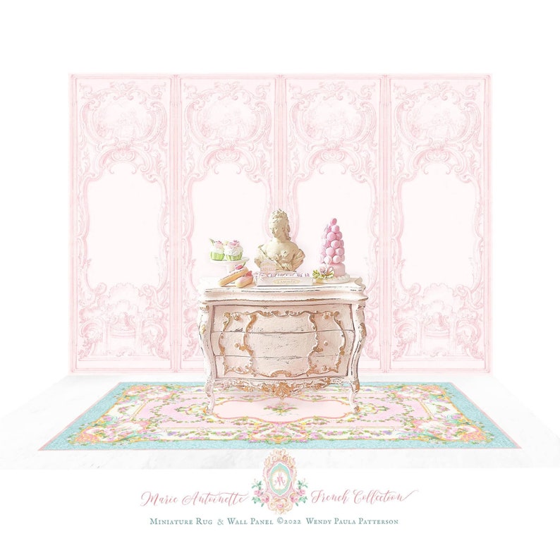 May include: A miniature chest of drawers with gold accents, a bust, and pastries, set against a pink wall panel backdrop. A floral rug with a light blue border lies underneath. Text reads: Marie Antoinette French Collection Miniature Rug & Wall Panel &copy;2022 Wendy Paula Patterson.