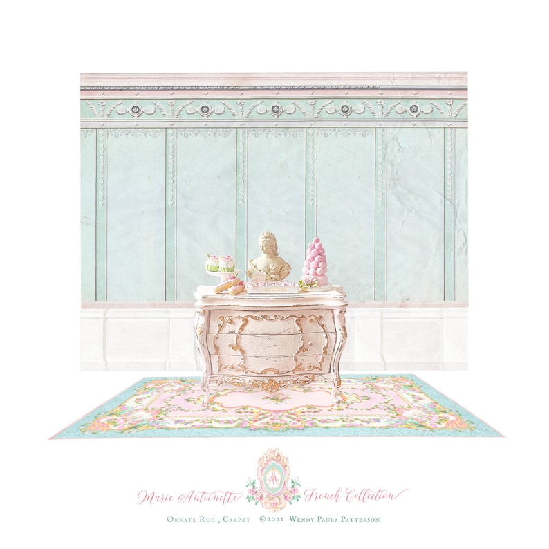 May include: A miniature chest of drawers in a distressed cream finish with gold accents, topped with a small bust, pastries, and a macaron tower. Below sits a rectangular rug featuring a pink floral pattern on a light blue border.