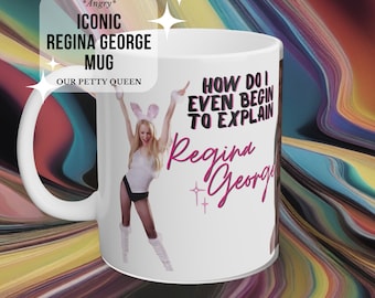 May include: White ceramic mug with a pink and black graphic of Regina George from the movie Mean Girls. The graphic includes the text "How do I even begin to explain Regina George".
