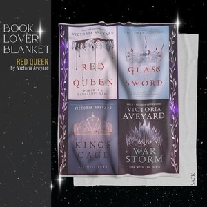 May include: A book lover blanket featuring the covers of Victoria Aveyard's "Red Queen" series. The blanket displays the titles "Red Queen", "Glass Sword", "King's Cage", and "War Storm". The blanket has a white background with a decorative border.