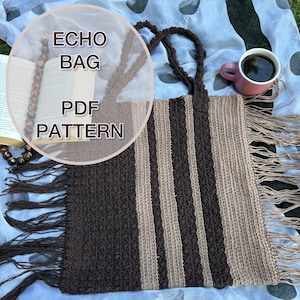 May include: A rectangular crochet tote bag featuring alternating vertical stripes of dark brown and light tan yarn. The bag includes two matching dark brown crochet handles and long fringe trim along the sides. Text on the image reads ECHO BAG PDF PATTERN.
