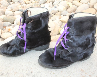 tall black fur boots