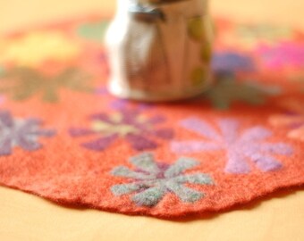 orange pin wheel round table runner