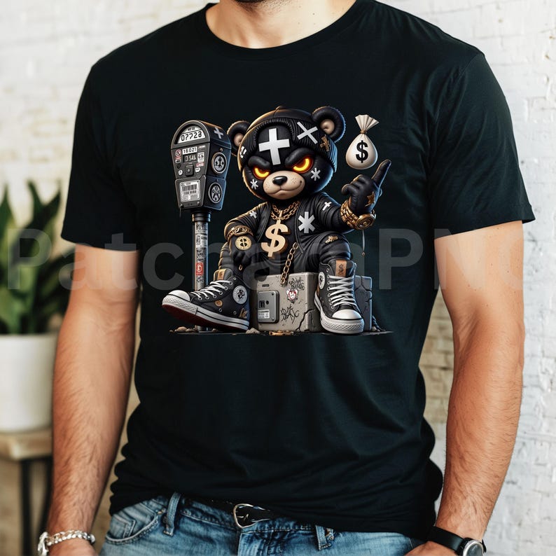 May include: Black t-shirt featuring a cartoon bear character wearing a leather jacket, gold chain, and sneakers. The bear is sitting on a box with a money bag and a parking meter in the background. The bear is pointing up.