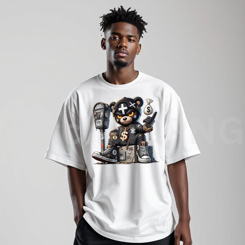 May include: White t-shirt featuring a cartoon bear character with a tough look, wearing a leather jacket, gold chain, and holding a money bag. The bear is sitting next to a parking meter. The design has a street style theme.