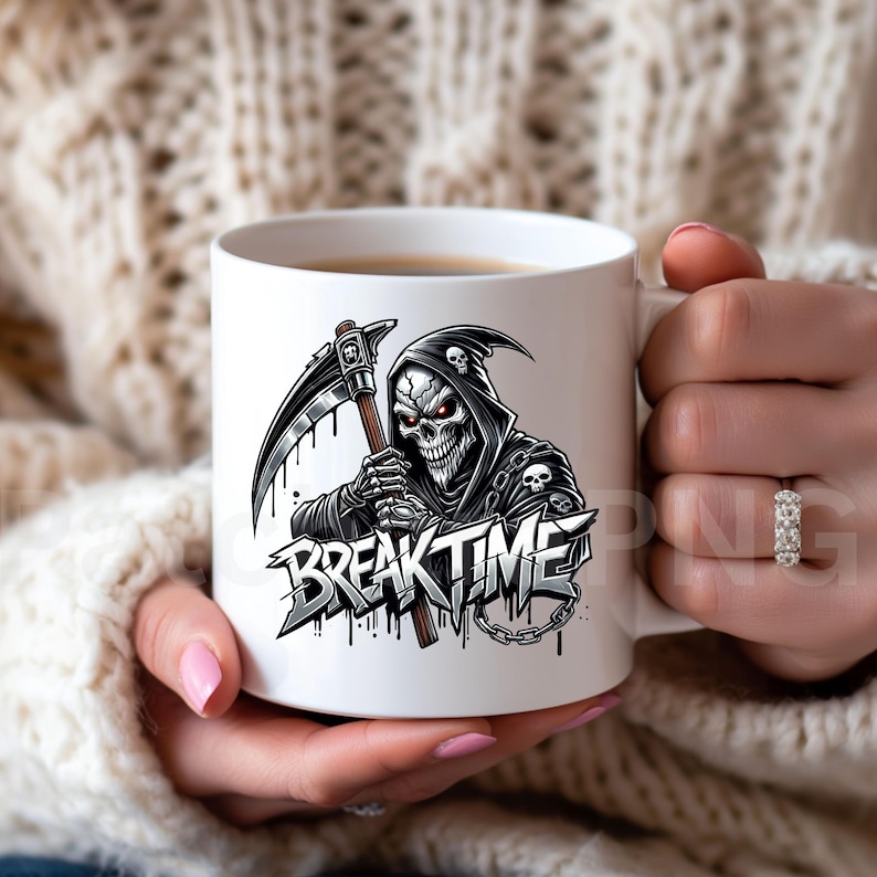 May include: White ceramic mug with a grim reaper design, holding a scythe, and the words "BREAK TIME". The grim reaper has red eyes and wears a black hooded cloak. The mug is held by a person. The design is in black and grey.