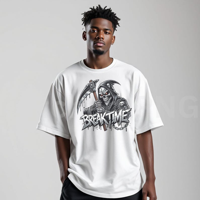 May include: White t-shirt with a graphic of a grim reaper holding a scythe, with the text "BREAK TIME". The reaper has a skull face with red eyes and is wearing a hooded cloak. The design is in black and grey.