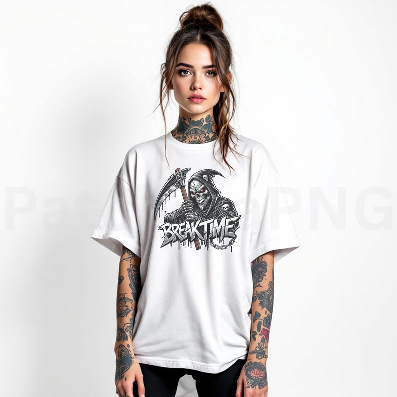 May include: White t-shirt with a black and grey graphic of the Grim Reaper holding a scythe. The text "BREAK TIME" is below the graphic. The shirt has short sleeves and a crew neck.