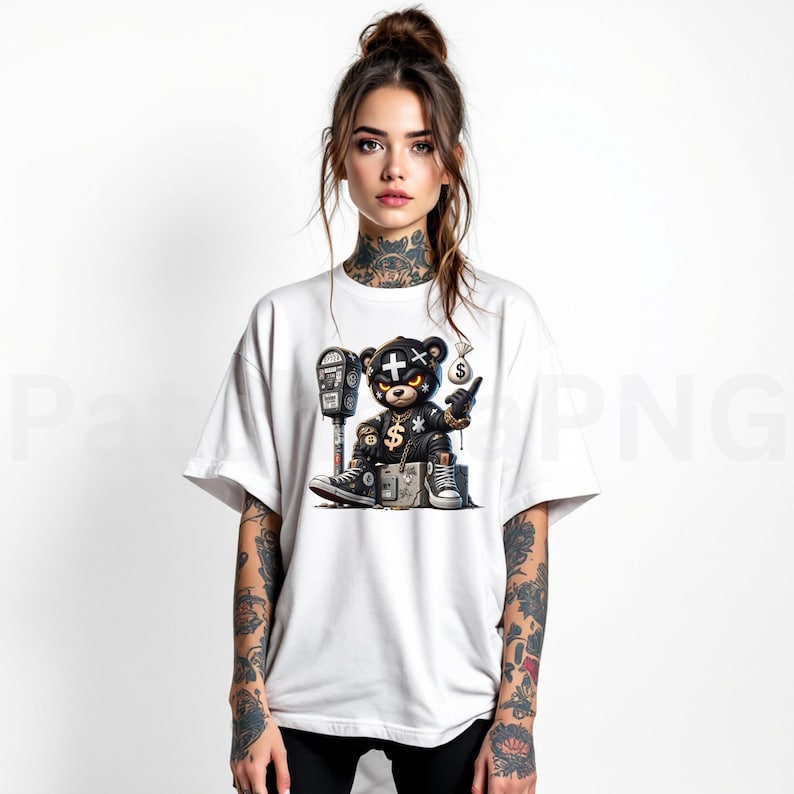 May include: White t-shirt featuring a detailed graphic of a black bear wearing a leather jacket, gold chain, and sneakers. The bear is holding a money bag and a cigarette, with a parking meter in the background.