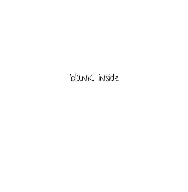 May include: A white background with the text "blank inside" written in black.