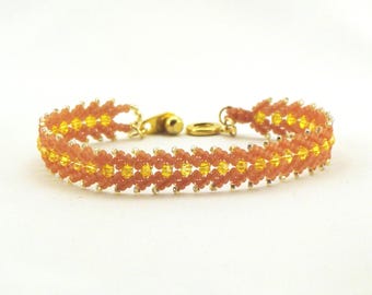Sunny Orange in Warm Peach and Gold feather bracelet