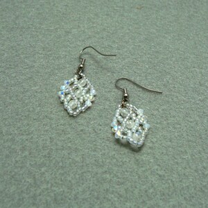 Moonstone in white waves dangling beadwoven earrings