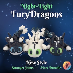 May include: Three articulated dragon figures featuring a black dragon with blue eyes, a white dragon with green eyes, and a black dragon with green eyes. Text reads: Night-Light Fury Dragons, New Style, Stronger Joints, More Durable.