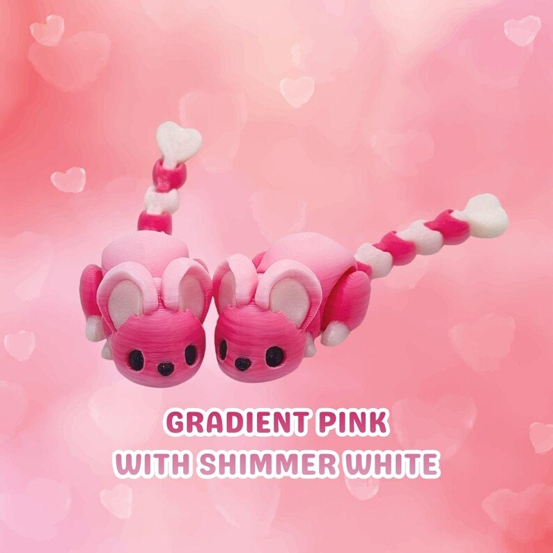 Mouse flexível com cauda em formato de coração – um brinquedo antiestresse adorável ou item de colecionador. Pink Gradient
