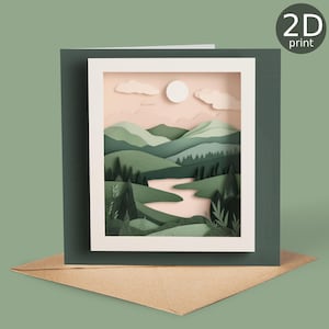 Könnte beinhalten: Eine Grußkarte aus geschichtetem Papier mit einer Landschaftsszene mit grünen Hügeln, einem Fluss und einer Sonne und Wolken am Himmel. Die Karte befindet sich vor einem dunkelgrünen Hintergrund mit einem braunen Umschlag. Der Text "2D print" befindet sich oben rechts.