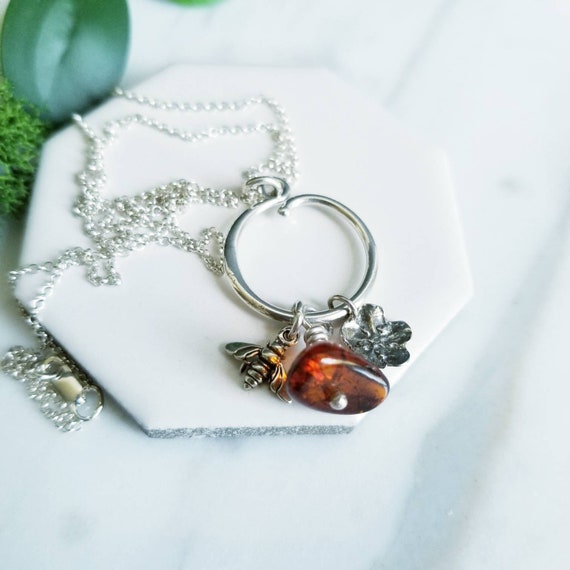 Sterling Silver Amber Bee Charm Necklace: Flower Accent
