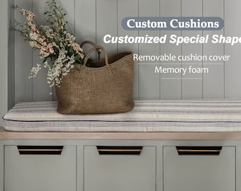 May include: A grey wooden bench with a striped cushion and a woven basket filled with flowers. The bench has three drawers with black handles. The text "Custom Cushions Customized Special Shape Removable cushion cover Memory foam" is displayed above the bench.