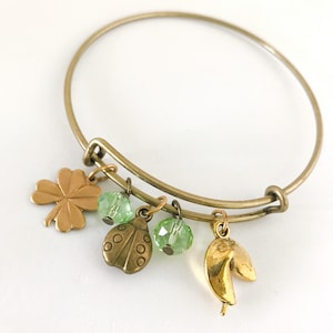 Lucky Charm Bracelet with Ladybug, Fortune Cookie, Four Leaf Clover & Green Bead Dangles Brass Tone Bangle Jewelry image 1