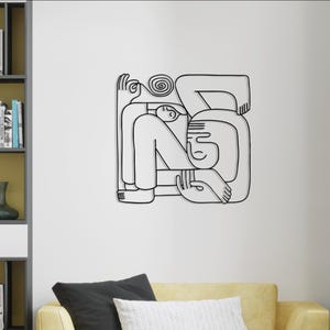 Arte in metallo in stile Picasso: decorazione murale astratta nera