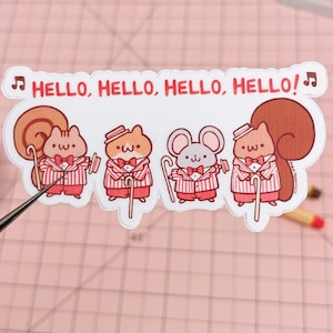 May include: A sticker with four cartoon animals wearing red and white striped suits and bow ties. The animals are a squirrel, a cat, a mouse, and another squirrel. The sticker says "HELLO, HELLO, HELLO, HELLO!" with musical notes on either side.