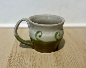 Green swirl and dot mug