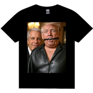 May include: Black t-shirt with a graphic image of two men. One man is wearing a black leather jacket and a ball gag. The other man is wearing a suit. The t-shirt has a Gildan tag.
