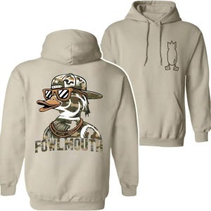 May include: Tan hoodie featuring a cartoon duck wearing sunglasses, a hat, and a gold chain. The text "FOWLMOUTH" is below the duck. The back of the hoodie has a bomb graphic.