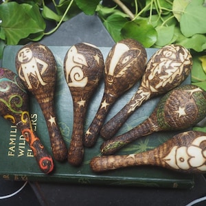 Mini Witches Wooden Rattle - Hare, Sheela Na Gig, Goddess, Rainbow Spiral, Greenman, Badger, Snake