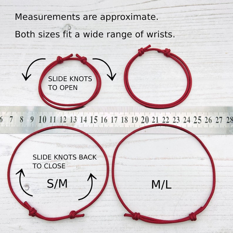 May include: Two red adjustable bracelets with sliding knots. The smaller bracelet measures 6.5 to 7.5 inches and the larger bracelet measures 7.5 to 8.5 inches. The bracelets are labeled "S/M" and "M/L" respectively.