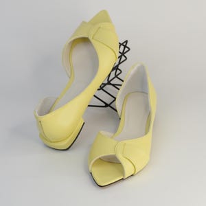 Bailarinas amarillo mantequilla: zapatos hechos a mano, diseño clásico y elegante de calzado.