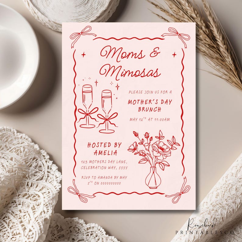 May include: A pink invitation with red text for a Mother's Day brunch. The invitation says "Moms & Mimosas" and includes details about the event, including the date, time, and location. It also includes a drawing of two champagne flutes and a bouquet of flowers in a vase.