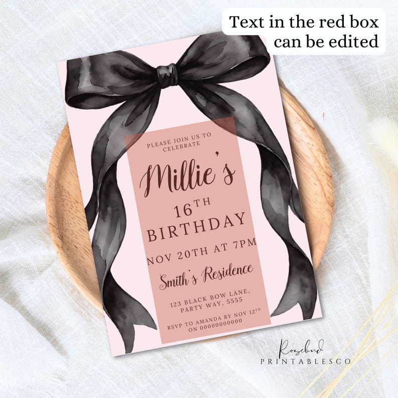 May include: A pink birthday invitation with a black ribbon design. The invitation reads "Millie's 16th Birthday" with event details. The invitation is on a wooden plate.