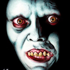 May include: A close-up of a pale, ghostly face with wide, dark eyes and a sinister smile. The face is painted in a realistic style with details like wrinkles and teeth.