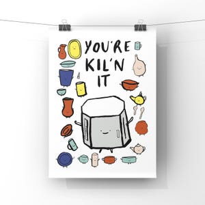 May include: A white background with the text "You're Kil'n It" in black. A cartoon oven with a smiling face is surrounded by various kitchen items, including mugs, bowls, and a teapot.